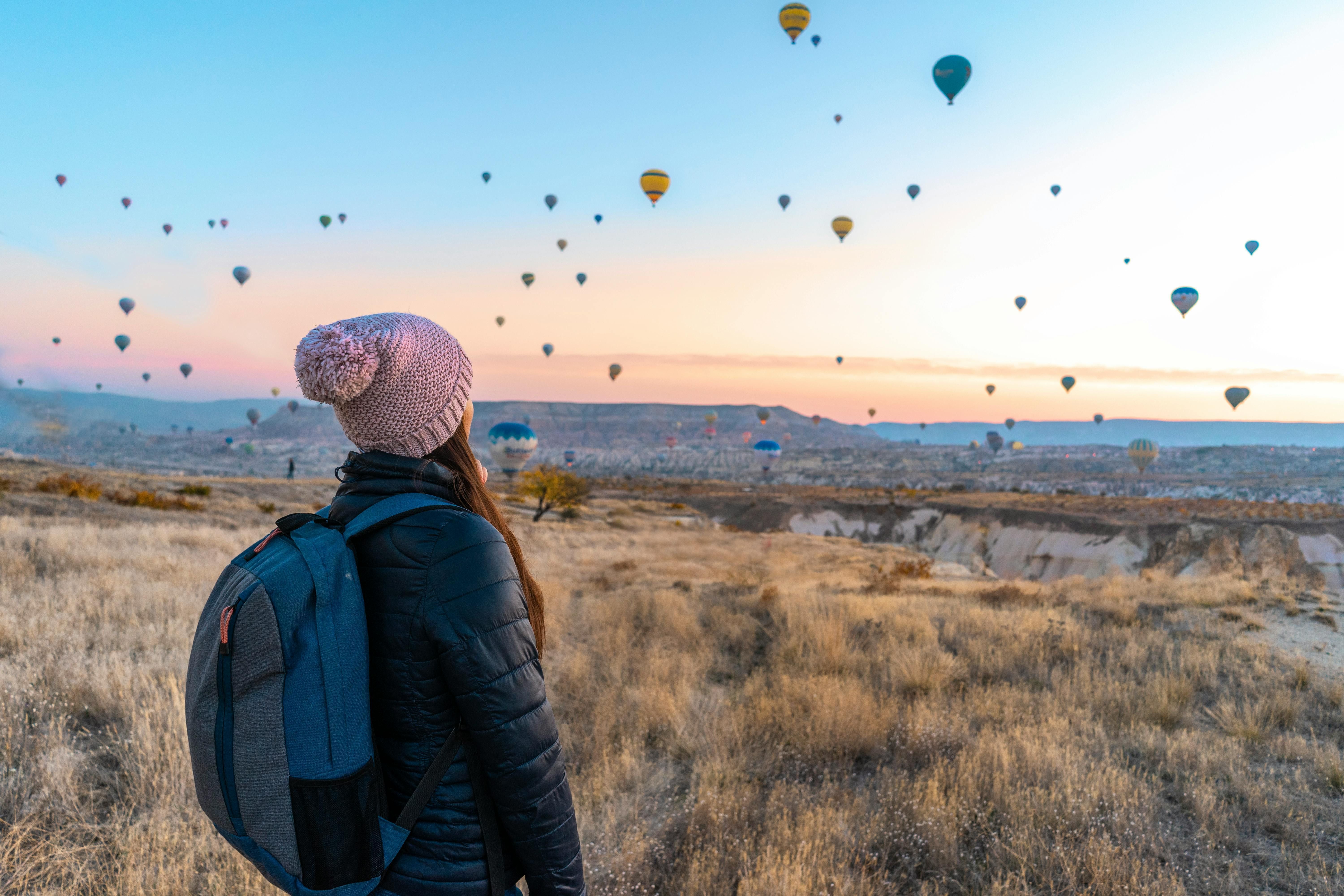 Woman watch ballon festival in Turkey.